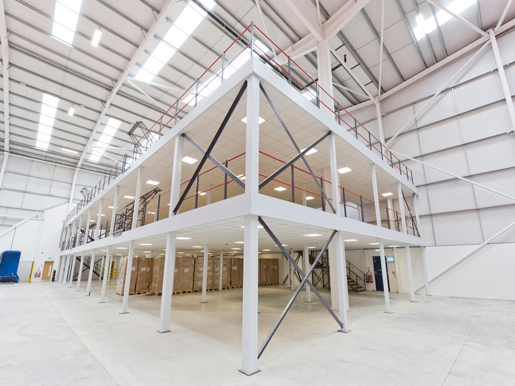 A professionally installed warehouse mezzanine floor with offices and storage space